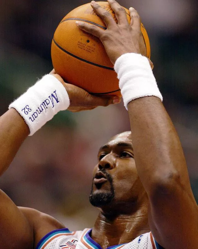 Karl Malone shoots free throw