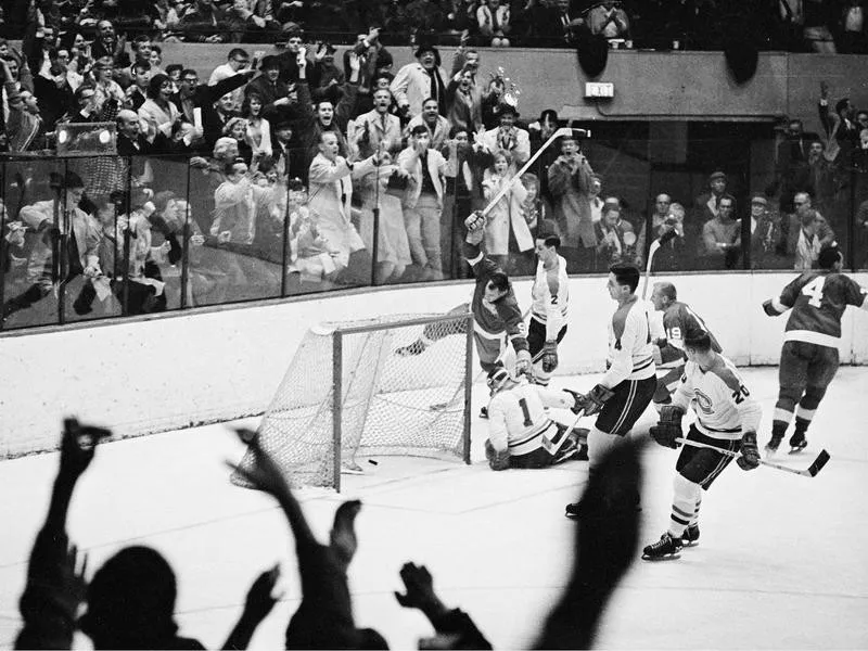 Gordie Howe celebrates after scoring goal