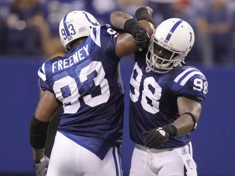 Dwight Freeney and Robert Mathis celebrate