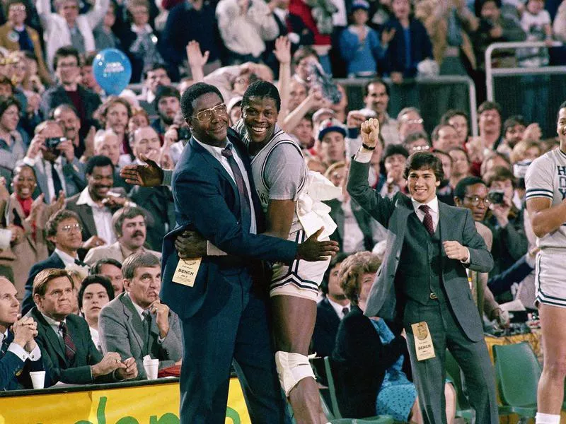 Georgetown center Patrick Ewing with coach John Thompson