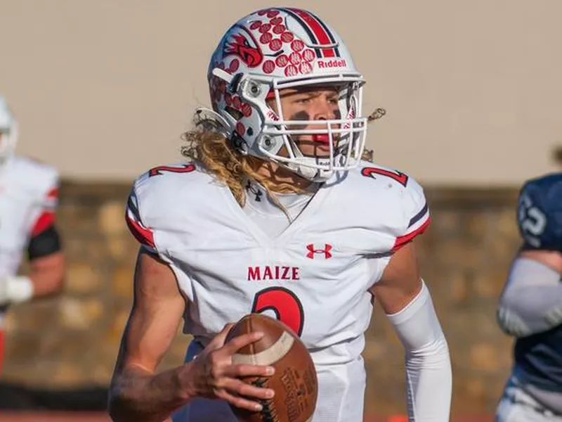 Maize High quarterback Avery Johnson looks to throw