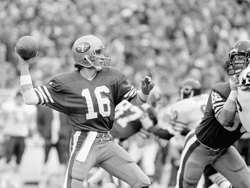 San Francisco 49ers quarterback Joe Montana prepares to unleash 13-yard first-down toss