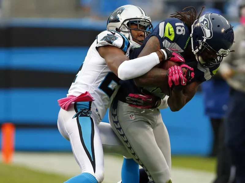 Josh Norman tackles Sidney Rice