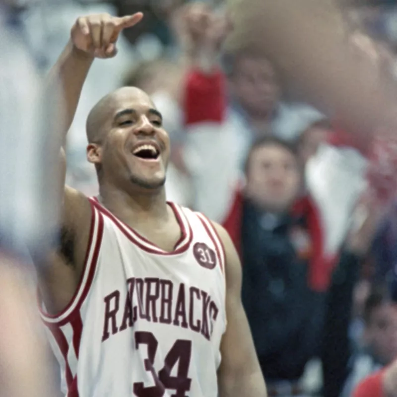 Arkansas forward Corliss Williamson celebrates