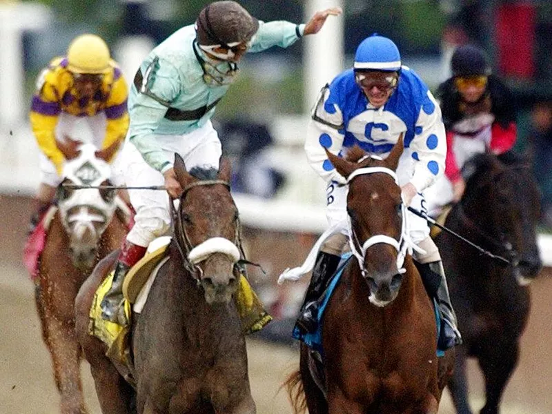 Edgar S. Prado riding Birdstone and Stewart Elliott riding Smarty Jones