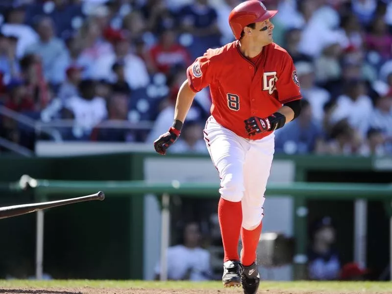 Aaron Boone watches his three- run home run against Atlanta Braves