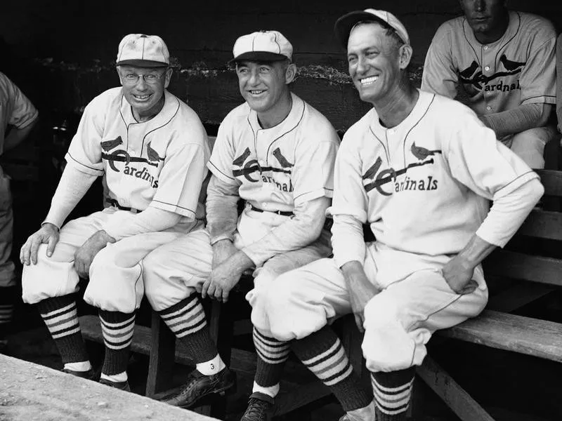 Frankie Frisch smiles in dugout