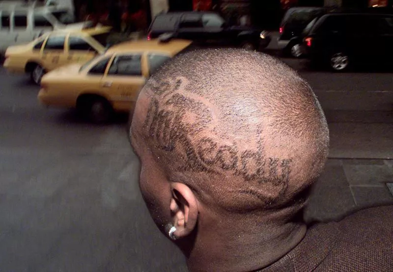 Anthony Mason with shaved head