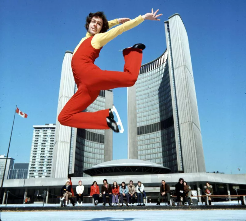 Toller Cranston jumping on ice