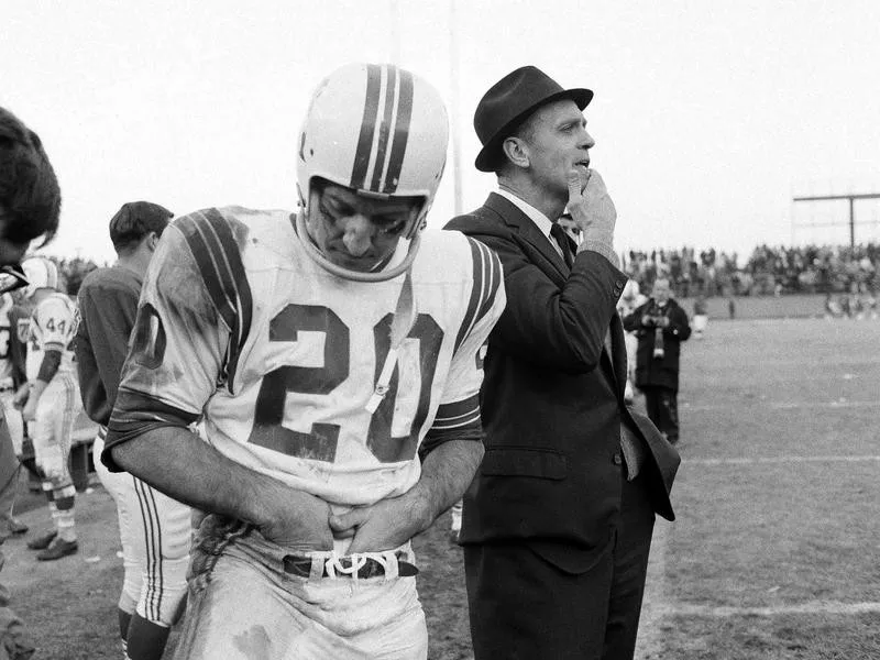 Mike Holovak stands next to Gino Cappelletti