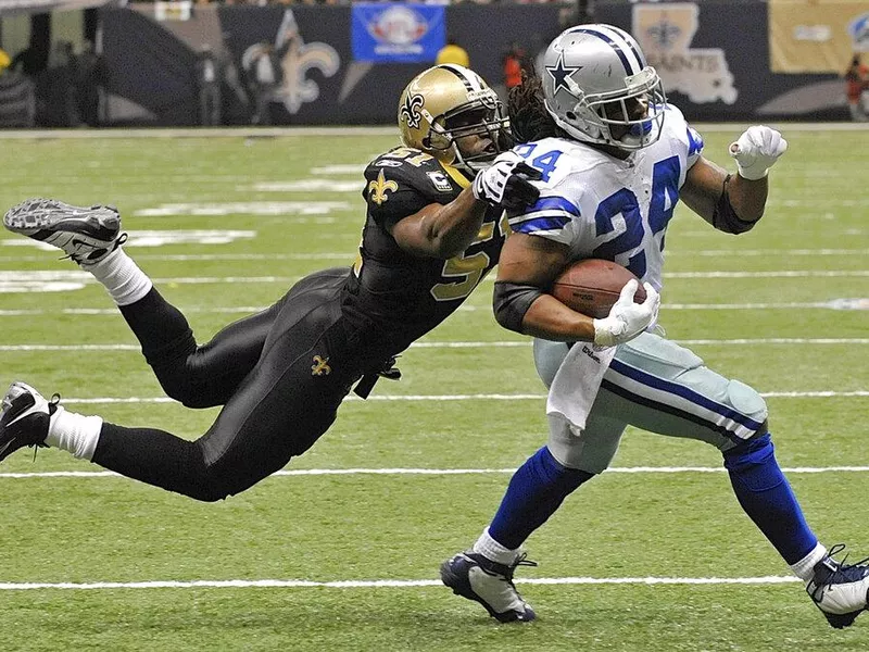 Jonathan Vilma and Marion Barber