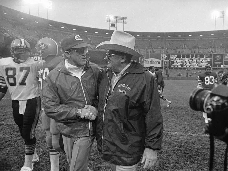 San Francisco 49ers coach Bill Walsh congratulates New Orleans Saints coach Bum Phillips