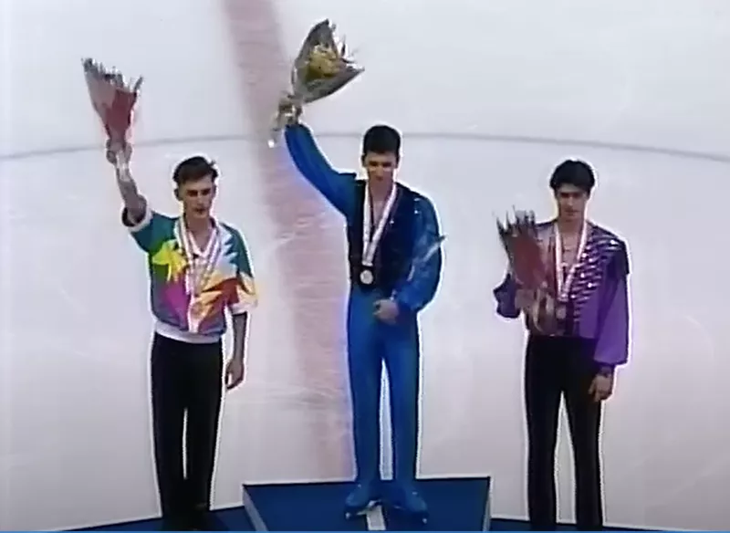 Grzegorz Filipowski winning a medal