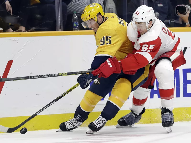 Danny DeKeyser and Matt Duchene compete for puck