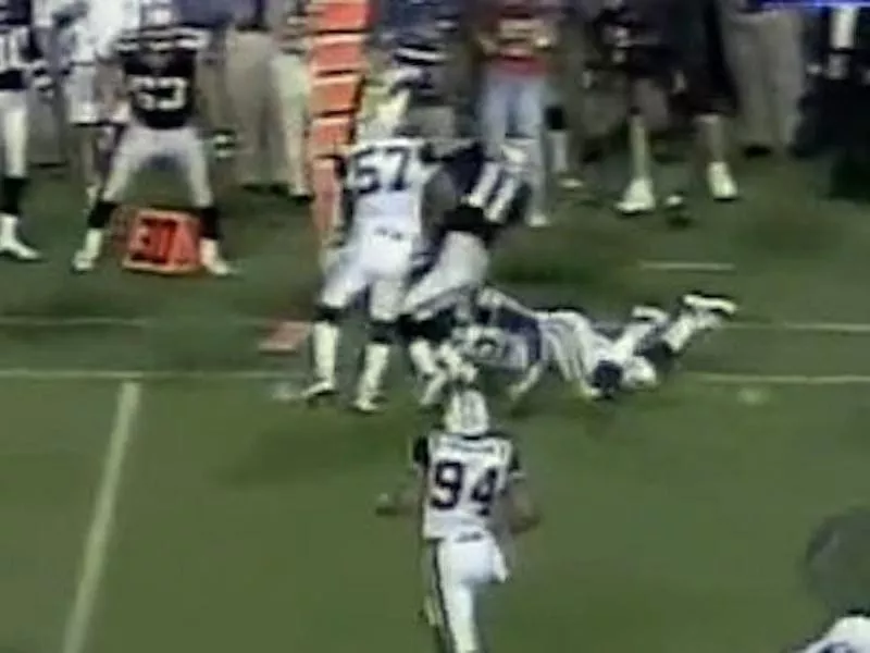 Mo Lewis lays a hit on Drew Bledsoe