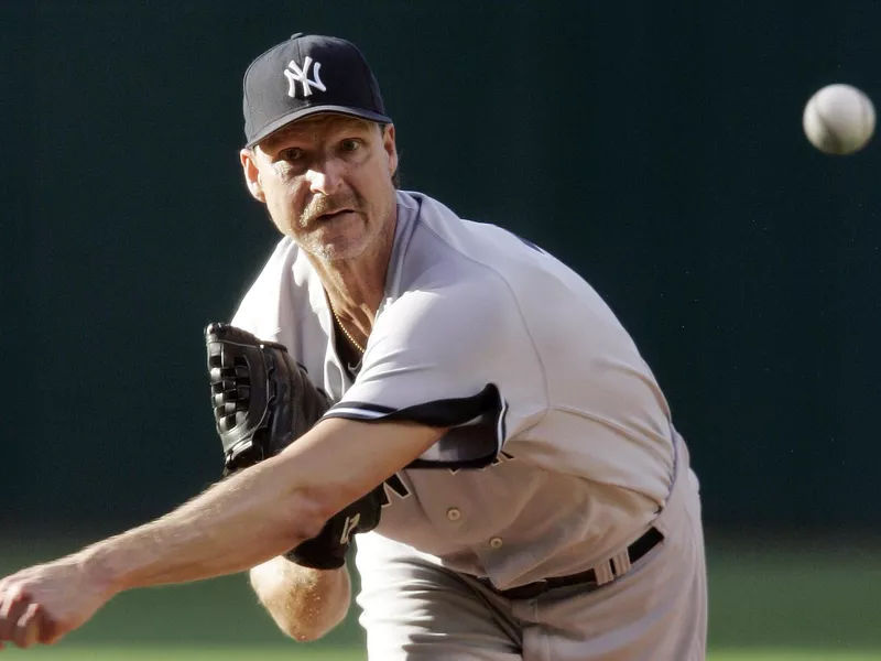 New York Yankees pitcher Randy Johnson pitches