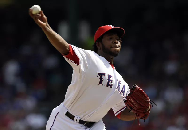 Neftali Feliz pitches against the Minnesota Twins