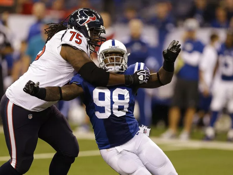 Robert Mathis and Derek Newton