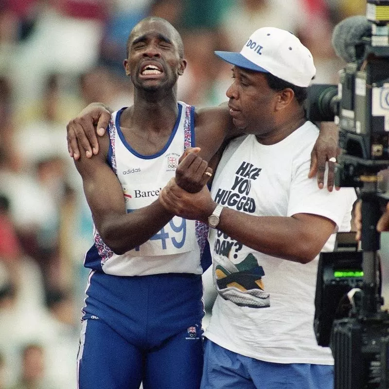 Derek Redmond is helped off track by his father Jim Redmond after injury