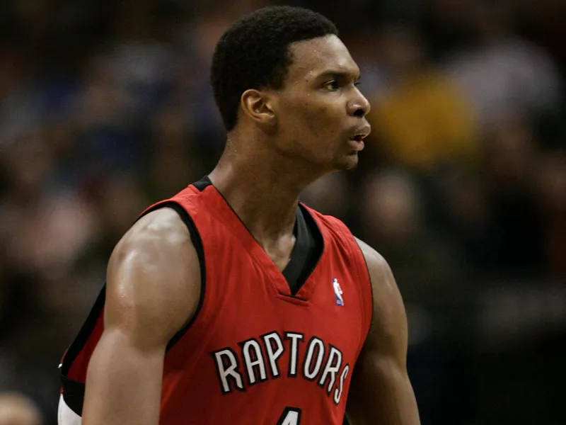 Toronto Raptors forward Chris Bosh reacts after sinking a shot