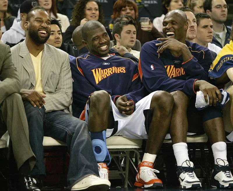 Baron Davis, Jason Richardson, Adonal Foyle smiling