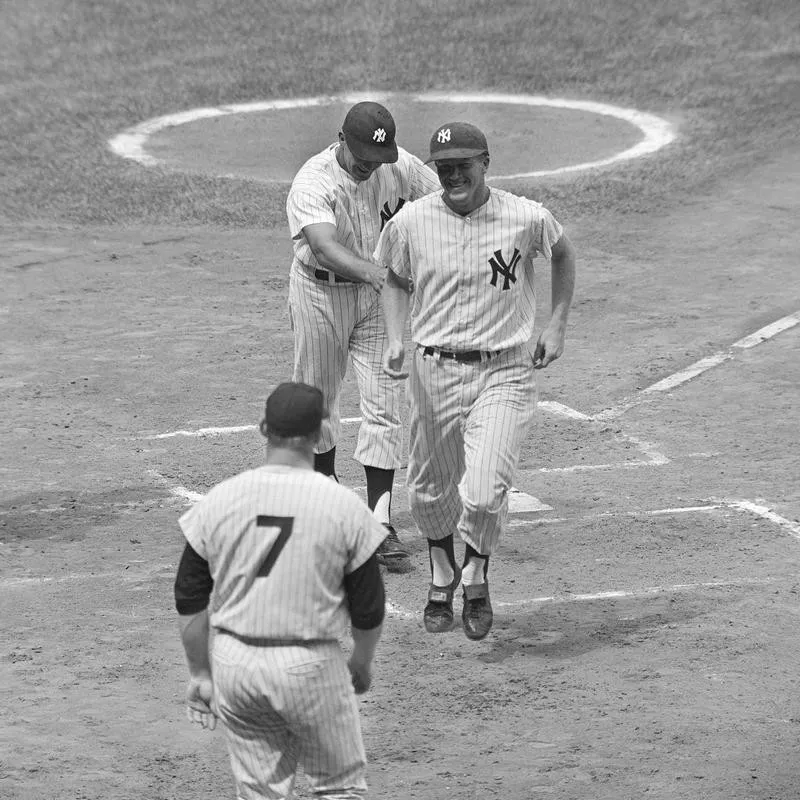 Bill Skowron celebrates Tony Kubek's home run