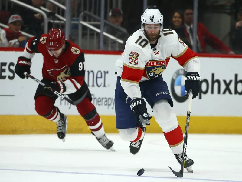 Brett Connolly skates with puck