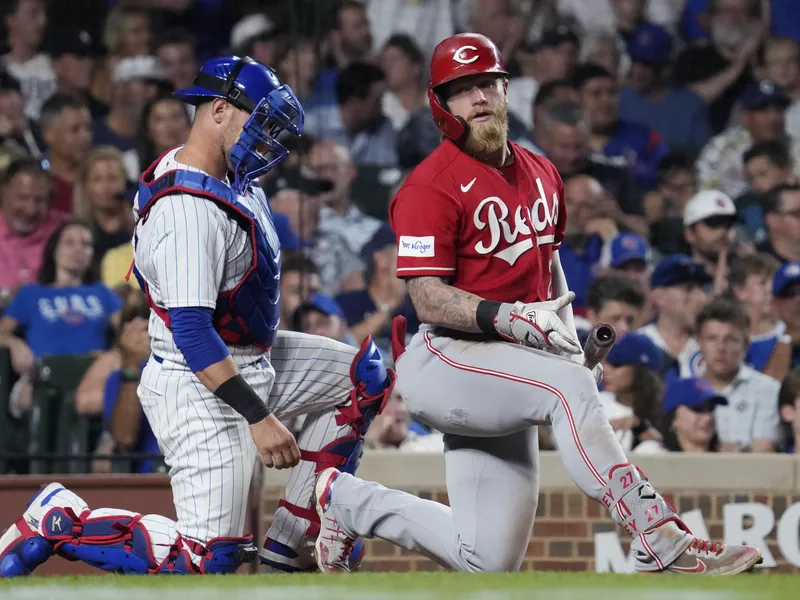 Cincinnati Reds hitter Jake Fraley strikes out