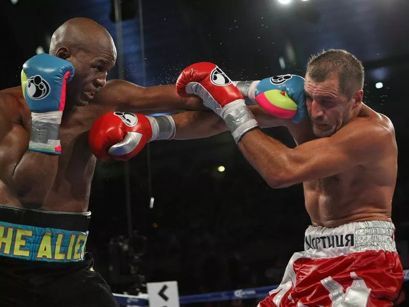 Bernard Hopkins punches Sergey Kovalev