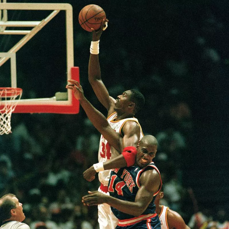 Hakeem Olajuwon goes up for two points