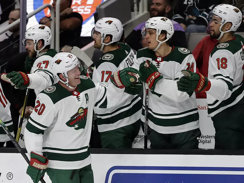 Minnesota Wild defenseman Ryan Suter congratulated after scoring