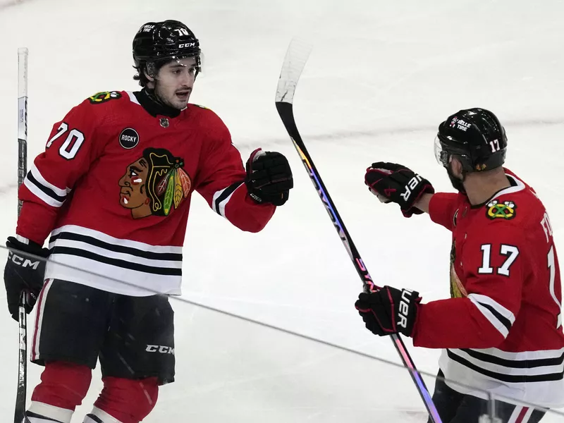 Blackhawks Cole Guttman, Nick Foligno