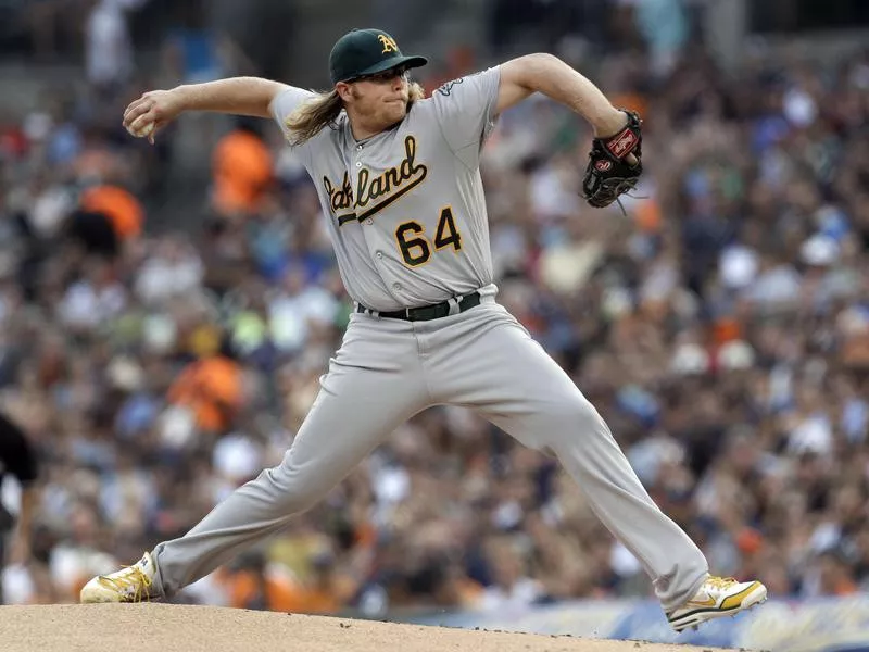 Oakland Athletics pitcher A.J. Griffin throws against Detroit Tigers