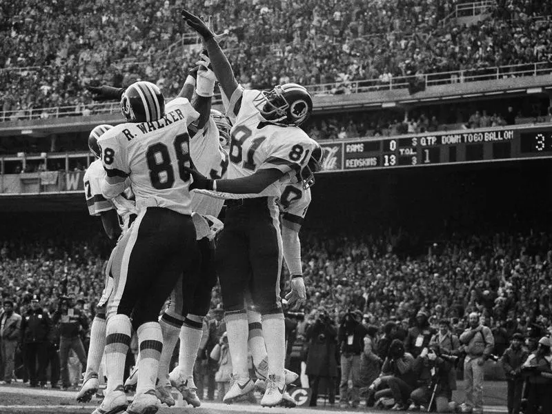 Fun Bunch high-fives in end zone