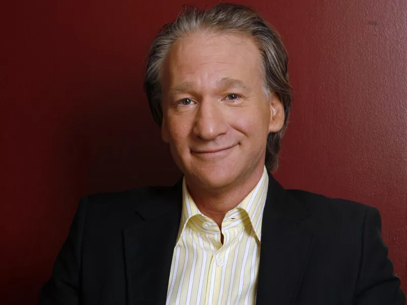 Bill Maher poses