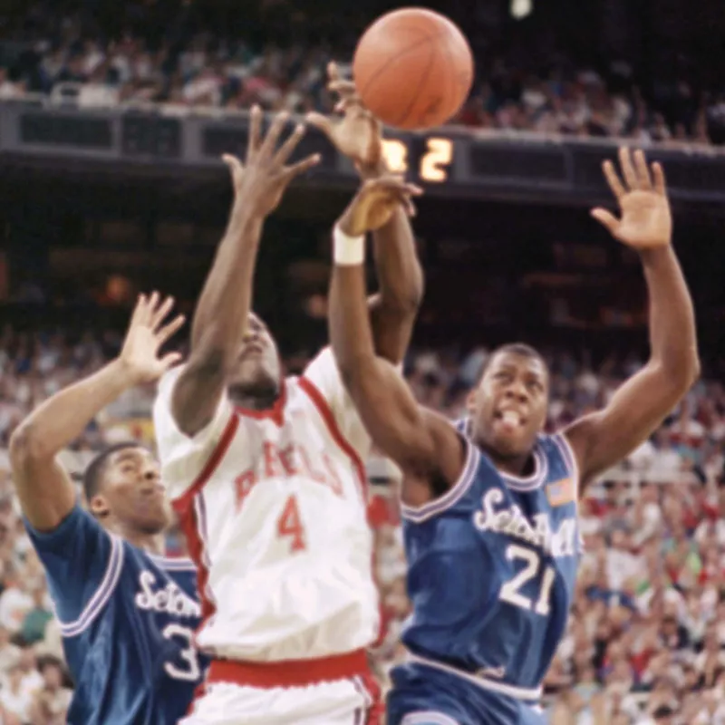 UNLV forward Larry Johnson battles Seton Hall's Anthony Avent