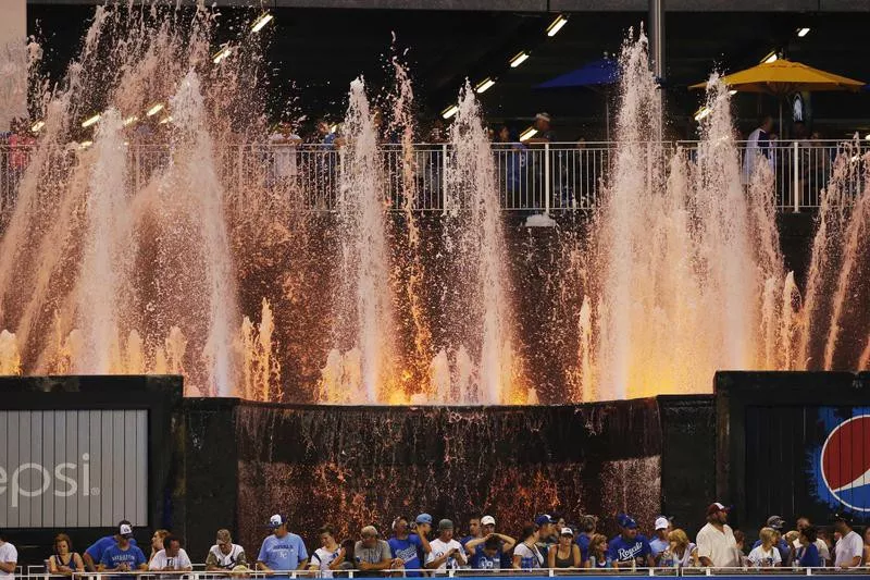 Fans by Kauffman Stadium fountains