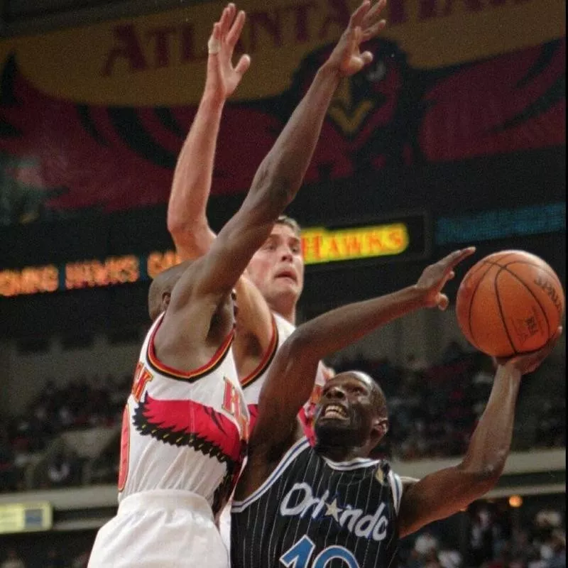 Mookie Blaylock and Christian Laettner