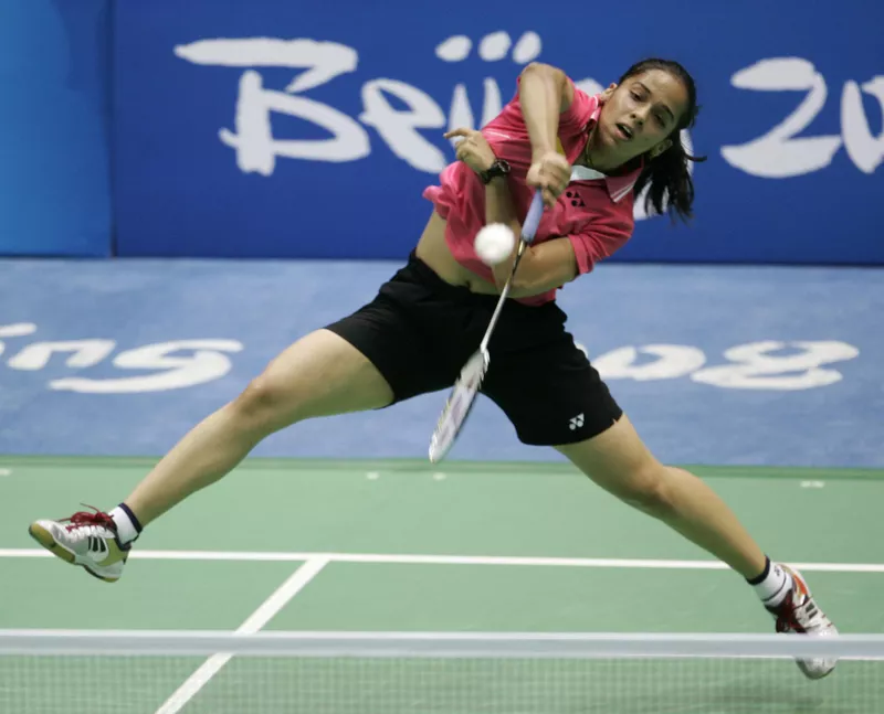 India's Saina Nehwal returns a shot