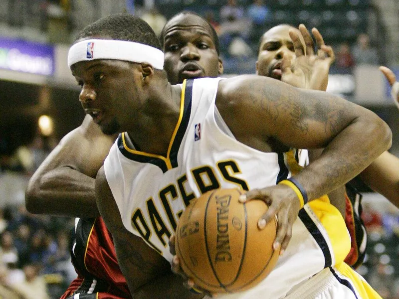 Jermaine O'Neal drives against Joel Anthony