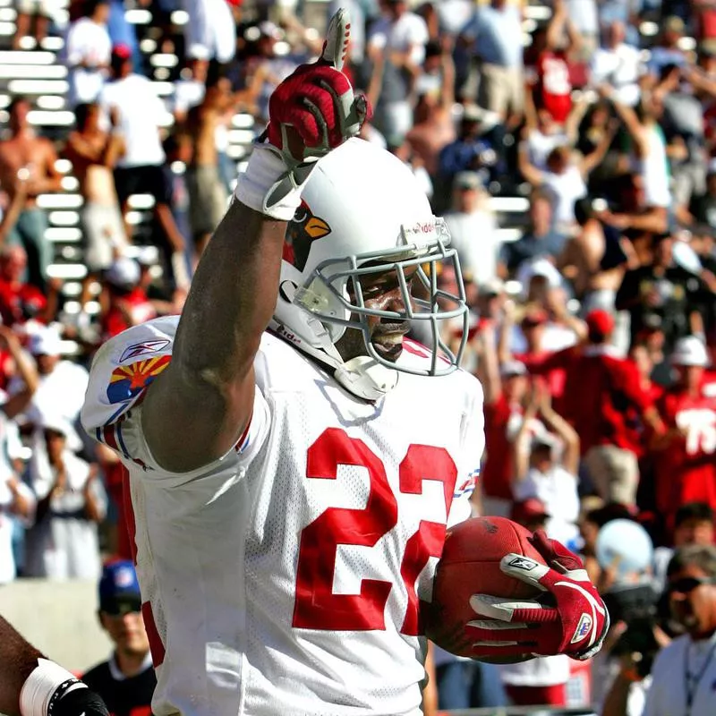 Arizona Cardinals runningback Emmitt Smith celebrates after running for touchdown