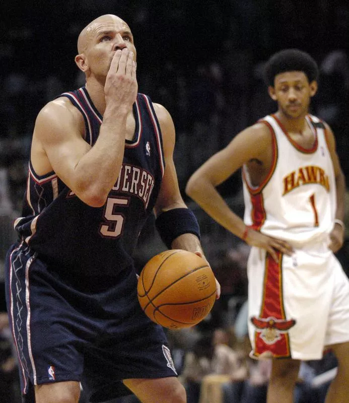 Jason Kidd kisses hand before free throw