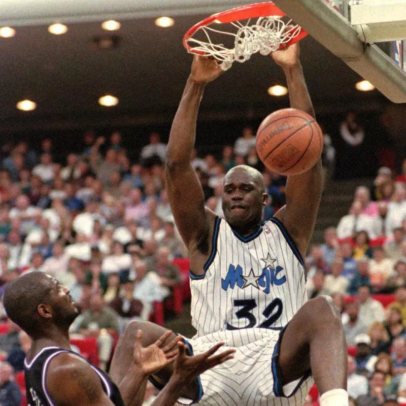 Shaquille O'Neal dunks