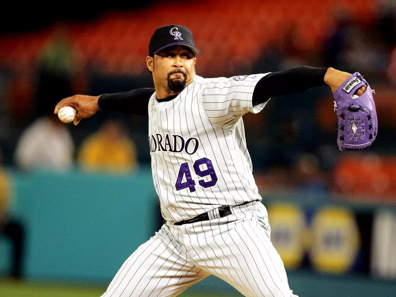 Jose Mesa pitching for Colorado Rockies