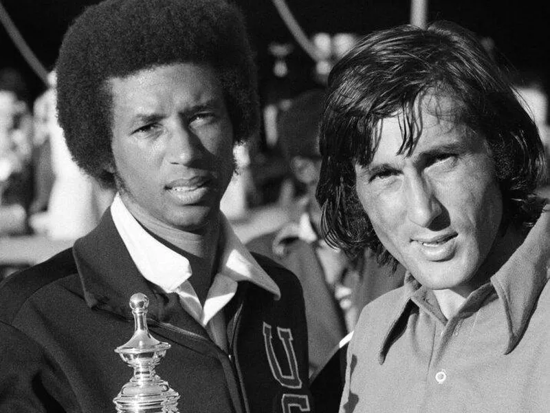 Ilie Nastase and Arthur Ashe in 1972