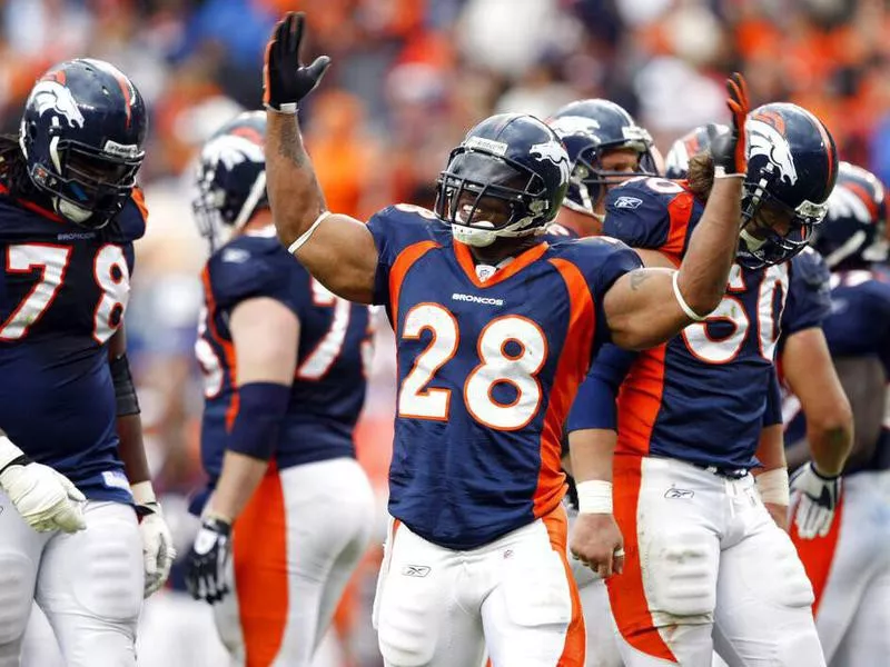 Denver Broncos runningback Michael Pittman celebrating