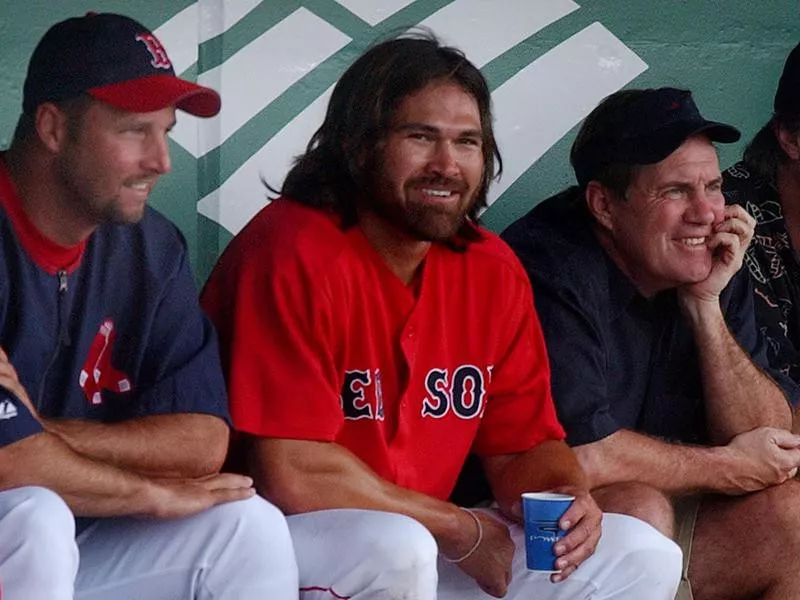 Johnny Damon smiles in dugout