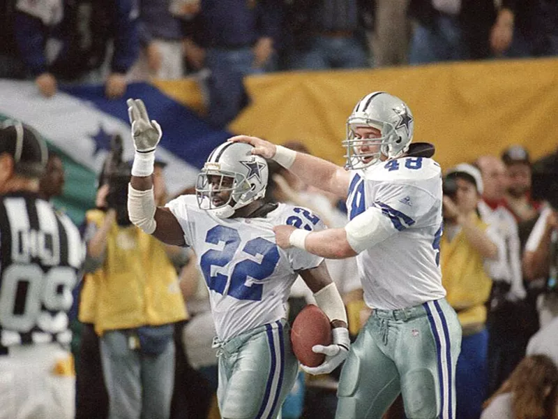 Daryl Johnston and Emmitt Smith