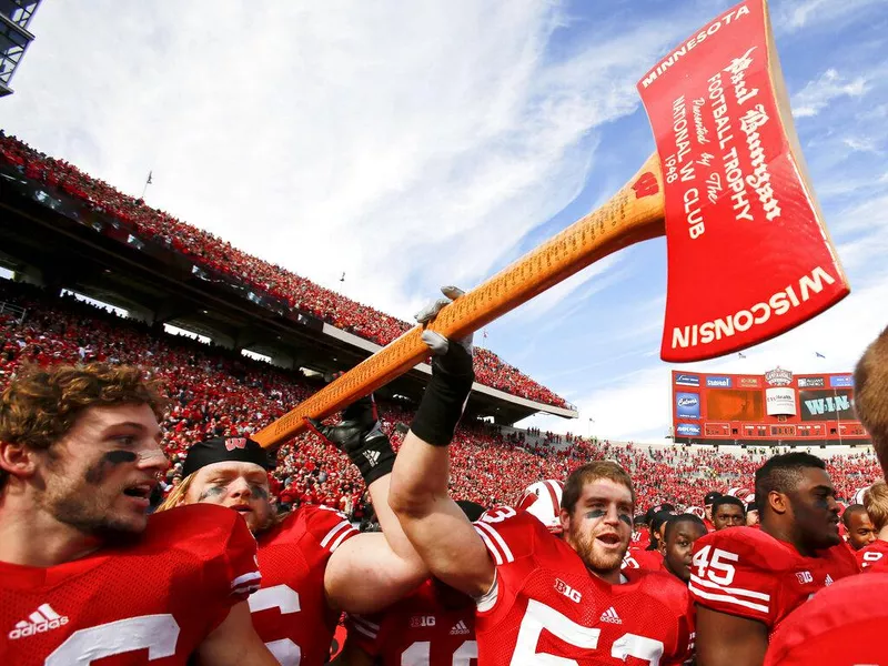 Mike Taylor carries the Paul Bunyan axe