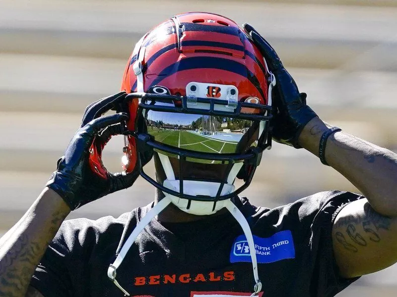 Tee Higgins with Cincinnati Bengals logo on helmet